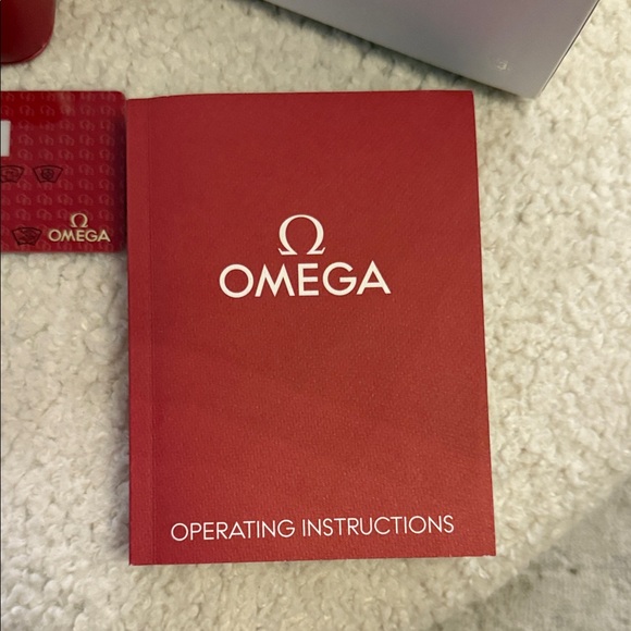 Omega Watch with Vibrant Orange Strap and Black Dial - Picture 15 of 16